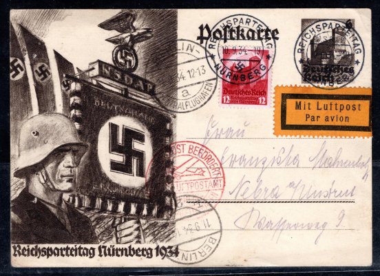 letecky zaslaná obrazová propagandistická celina 6 Pfg, sjezdu partaje Norimberk 1934, dofrankovaná, kašezové červené razítko německé letecké pošty, příchozí letecké a poštovní Berlin, letecká nálepka, zajímavá celistvost