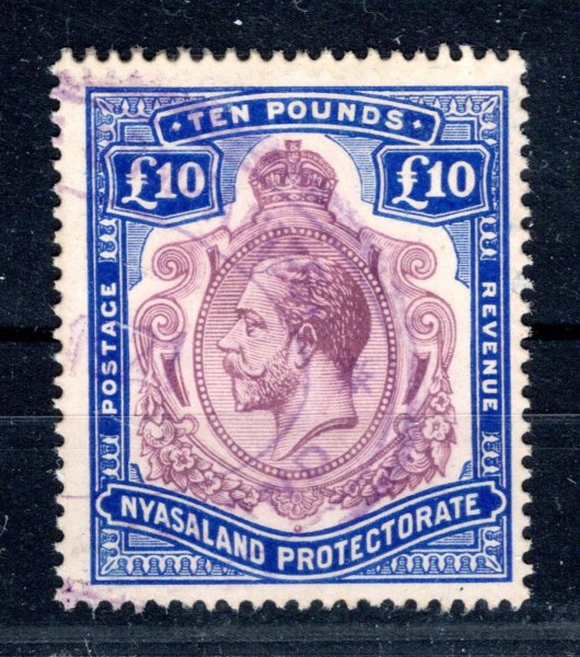 Nyasland Protectorate - známka 10 Libra s lehkým fiskálním razítkem, reparovaný jeden zoubek, jinak bezvadné, vysoký nominál 