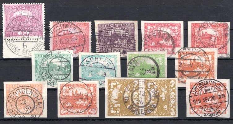Sestava 13 různých razítek na hradčanských známkách.